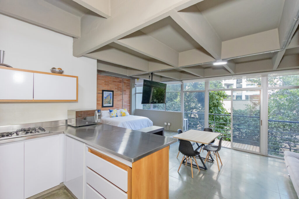 Gudi Loft 402 industrial-style open kitchen and bedroom